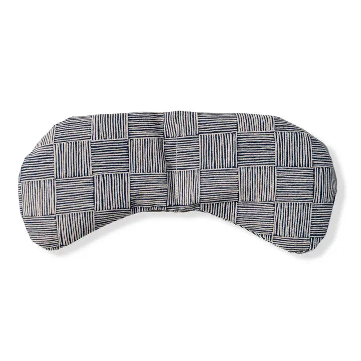 An eye mask therapy pack with a basketweave pattern in black and white. displayed on a white background.
