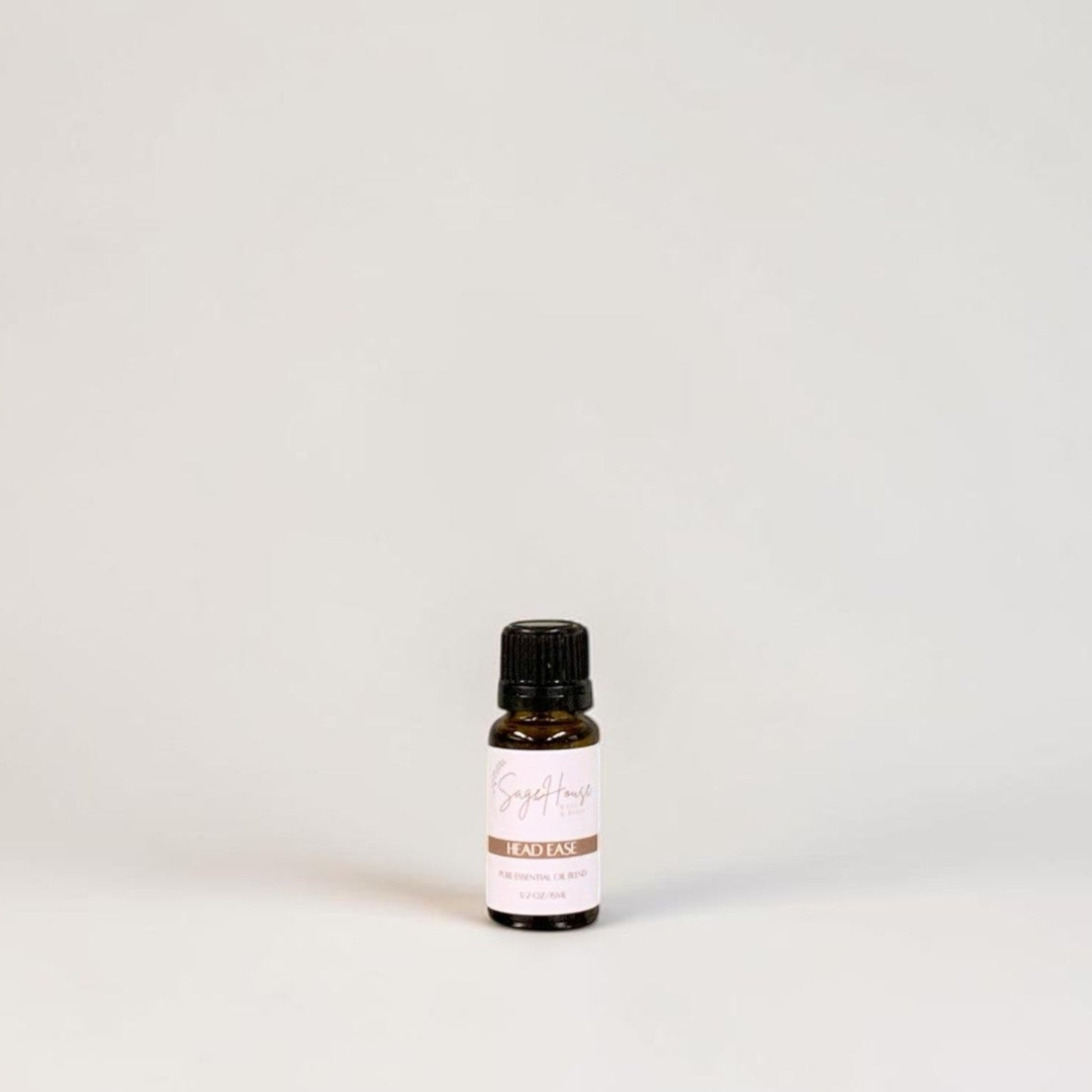 Amber bottle with label on a grey background.