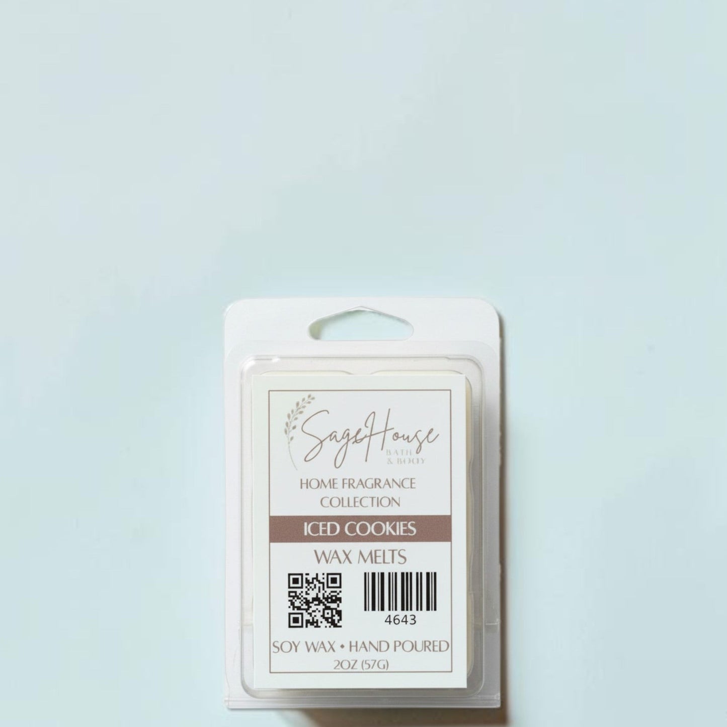 Scented wax melt packaging with brand label on a grey background