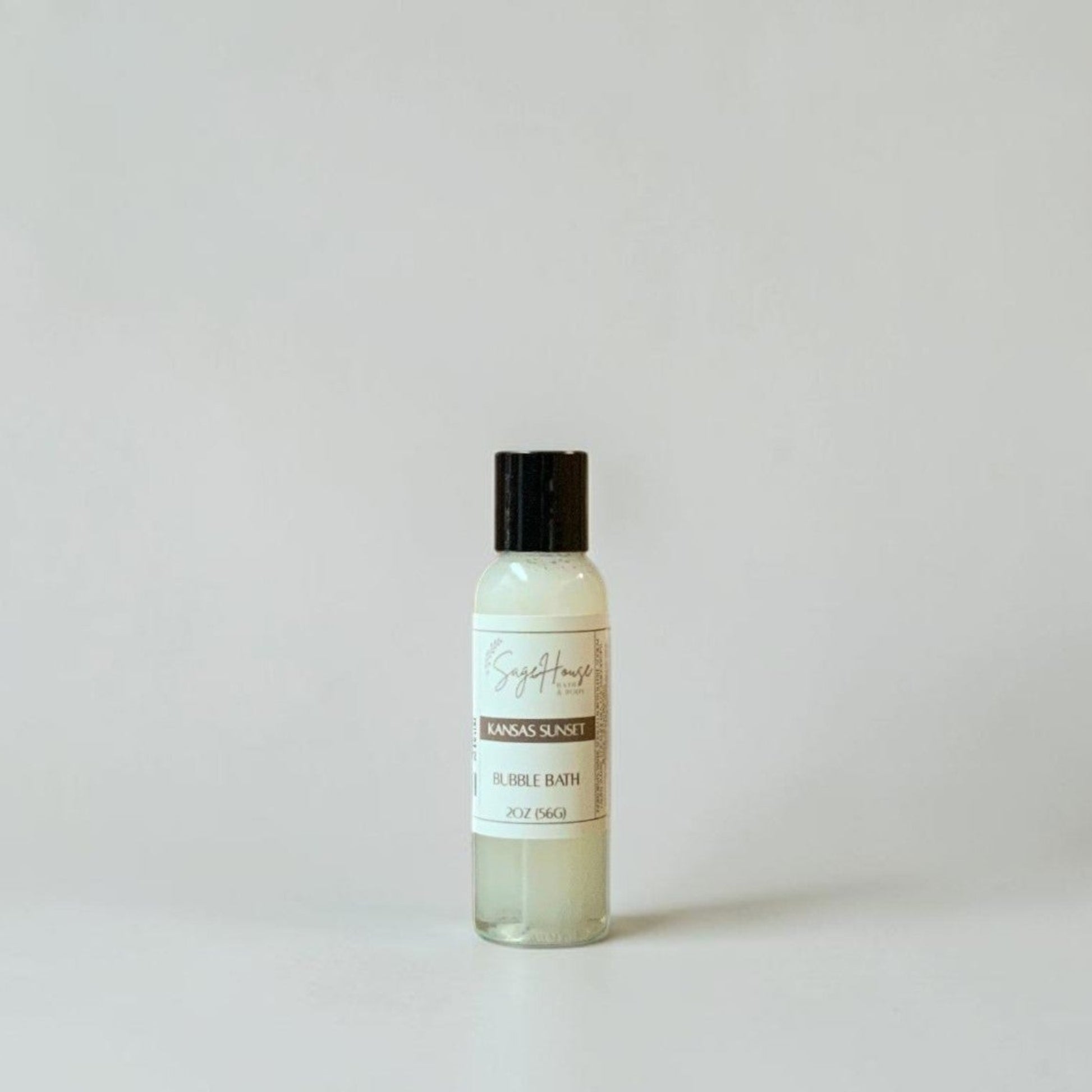 Bottle of bubble bath on a light gray background