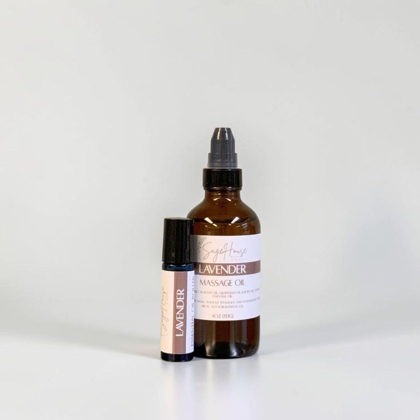 A roller bottle and pump bottle with labels. On a white background.