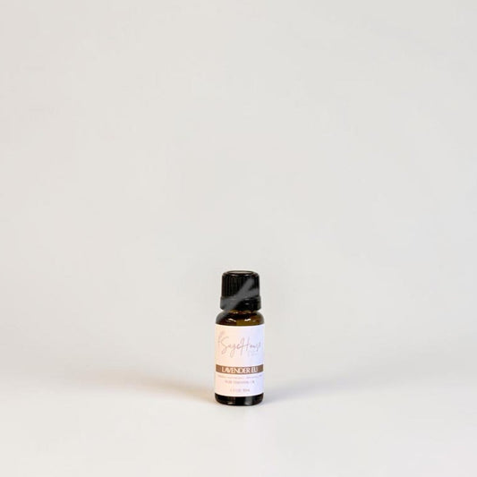 Amber bottle with label on a grey background.