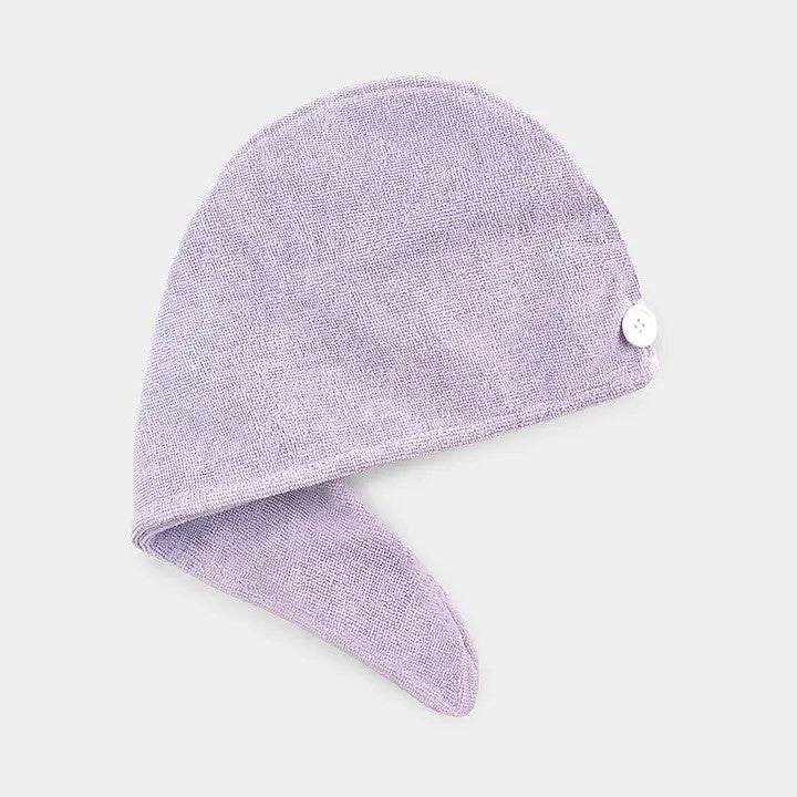 A lavender microfiber hair turban with a button fastener designed to wrap around the head.