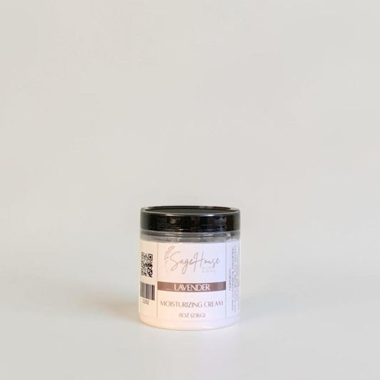 A labeled jar with a black lid. On a neutral background.