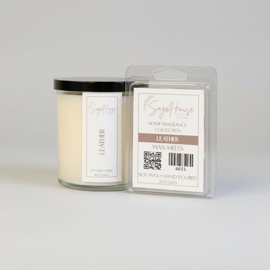 A white soy wax candle in a clear container, next to a clear clamshell wax melt package. placed on neutral background.