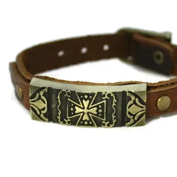 bracelet with brown leather and bronze faceplate with a cross design.