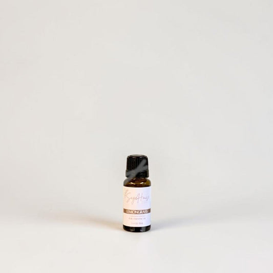 Amber bottle with label on a grey background.