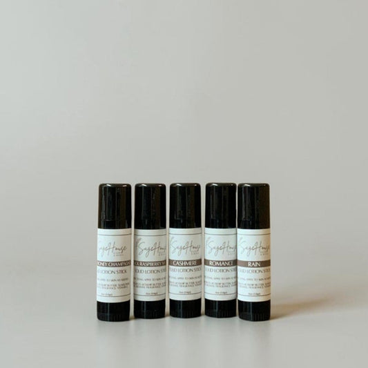 Five black tubes with labels on a light gray background