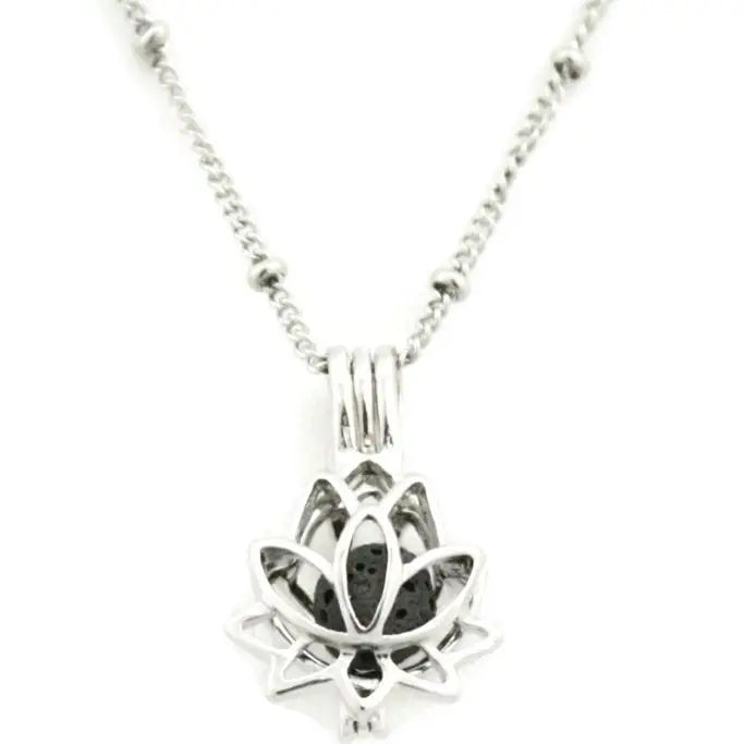 A silver lotus shaped necklace with lava bead inside. on a silver chain
