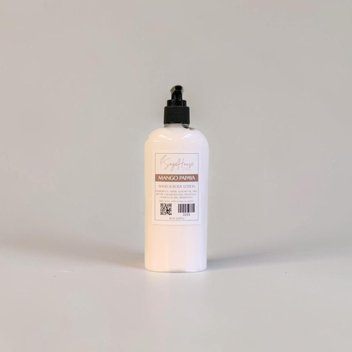 A large bottle of lotion with black pump top and white label. On a white background.
