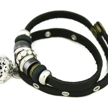 bracelet with black leather and silver, black & gemstone beaded accents. lava bead inside of silver ball