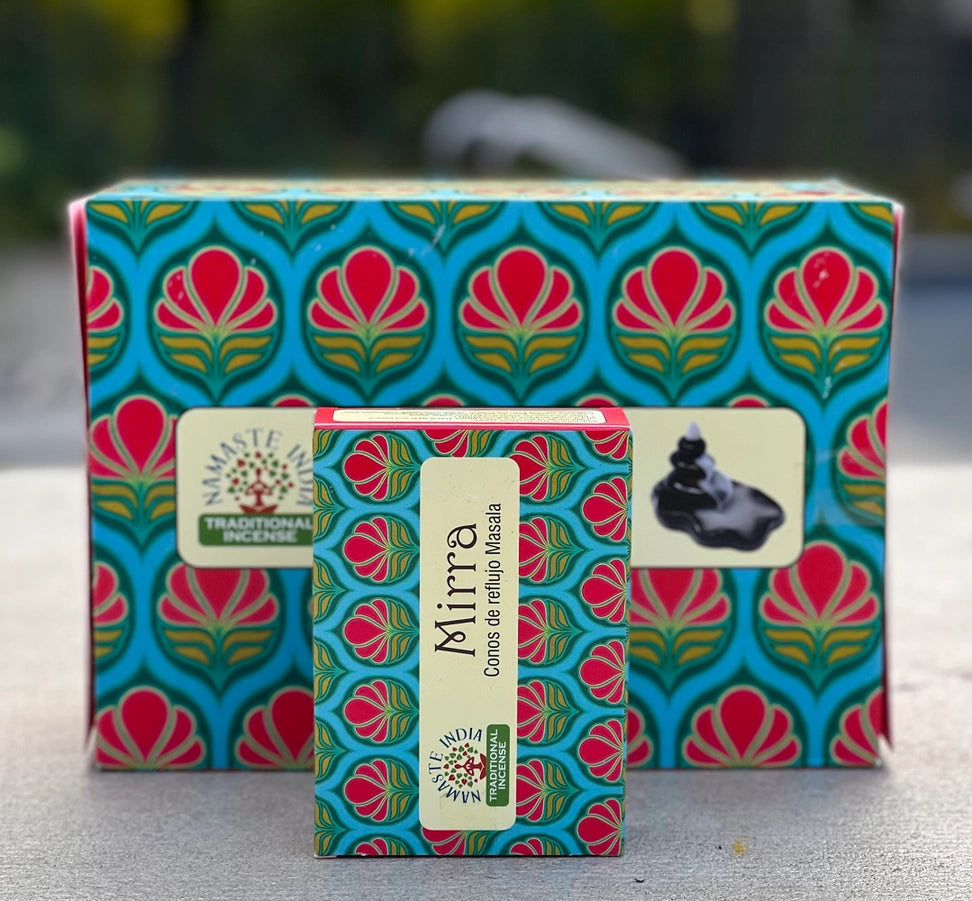 Small box of incense cones, with larger box behind with a nature background
