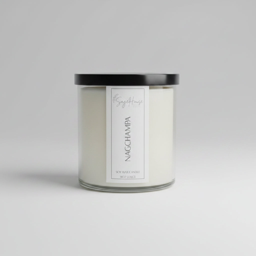 A white soy wax candle in a clear container, on a neutral background