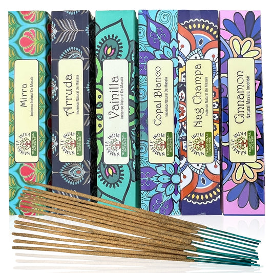 A collection of incense sticks in various scents, each labeled with different fragrance names such as Mirra, Arruda Vanilla, Copal Blanco, Nag Champa and Cinnamon, displayed in front of their colorful patterned packaging.
