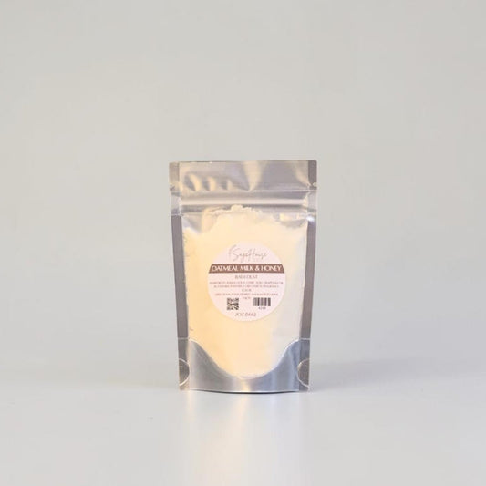 Clear plastic packaging with a white substance on a gray background
