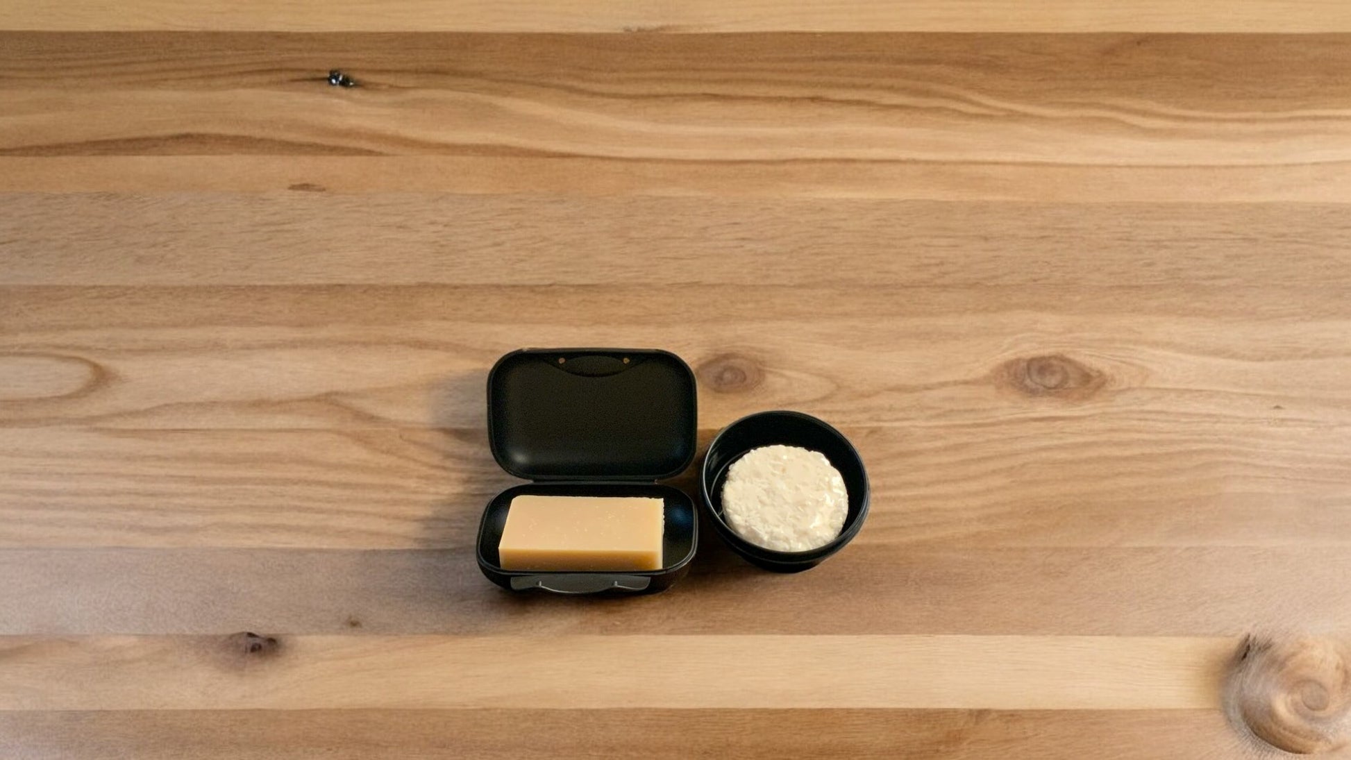 2 sizes of soap cases with a bar of soap and a shampoo bar displayed in each. Soap & shampoo not included.