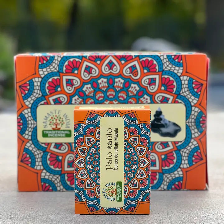 Small box of incense cones, with larger box behind with a nature background