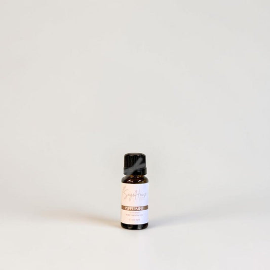 Amber bottle with label on a grey background.