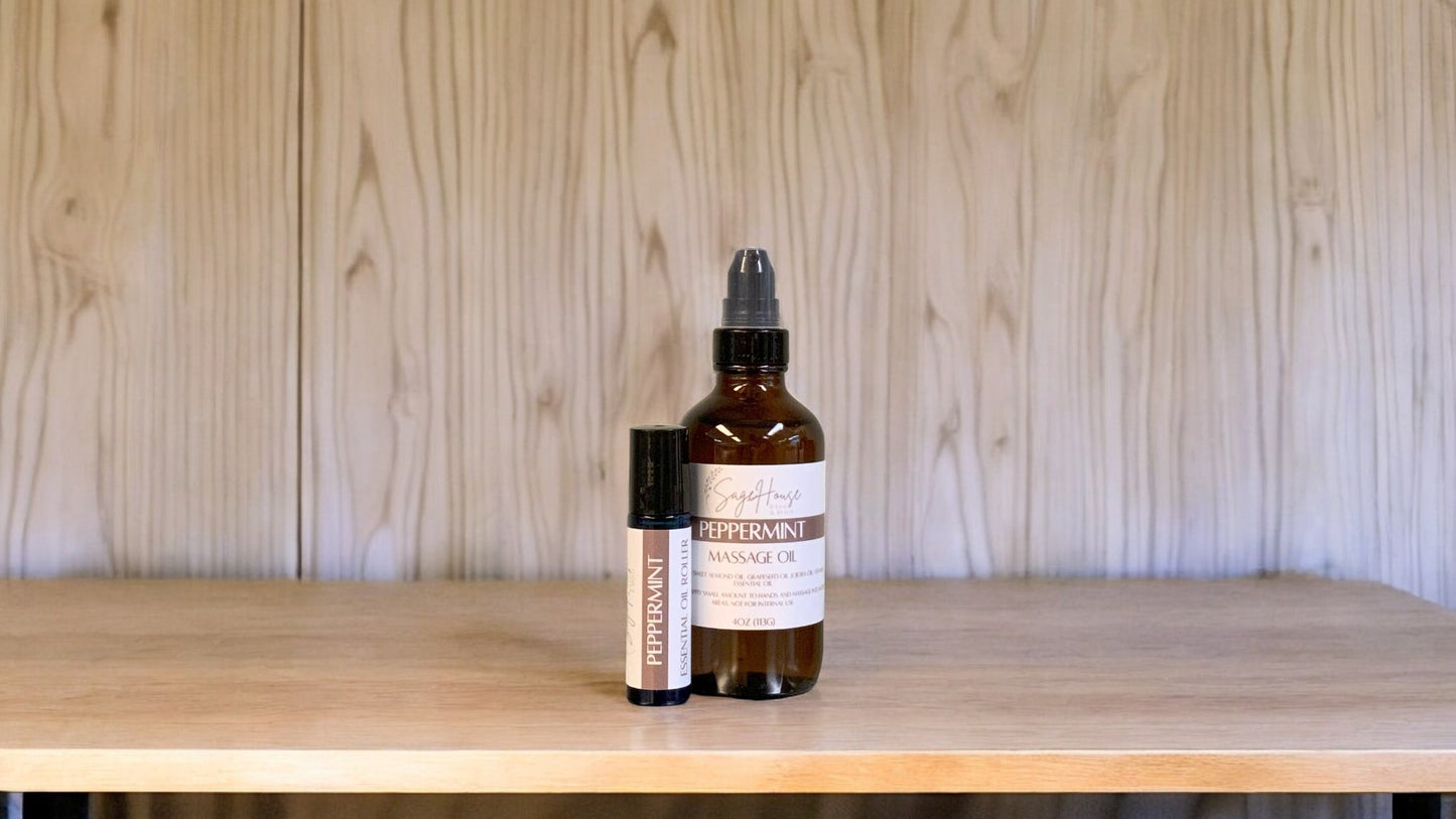 A bottle with a treatment pump, and a roller bottle labeled with 'Peppermint Massage Oil', positioned on a wooden surface.
