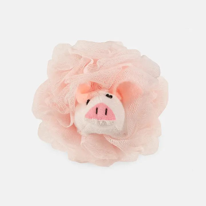A pink pig-shaped scrubbie with a pink face, designed for use as a bath sponge.