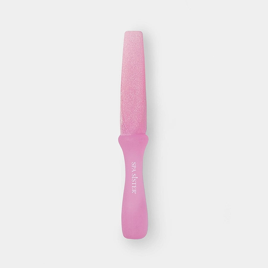 A pink ergonomic callus remover with a textured surface and a handle.