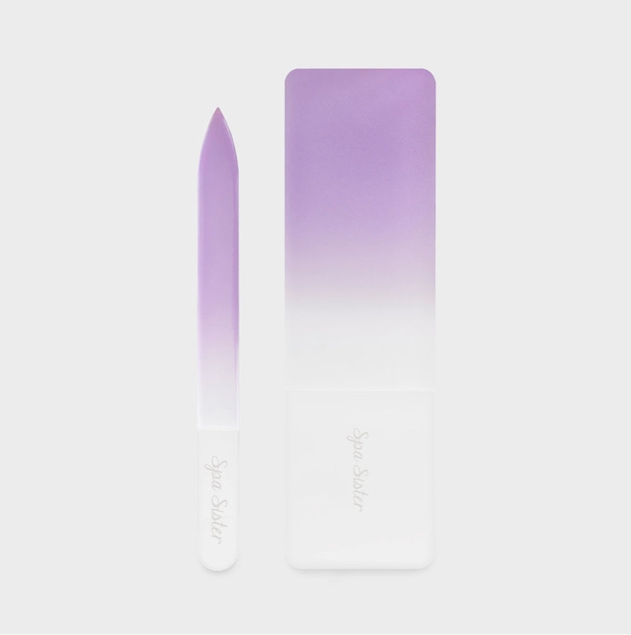 Purple ombre nail file on a light gray background