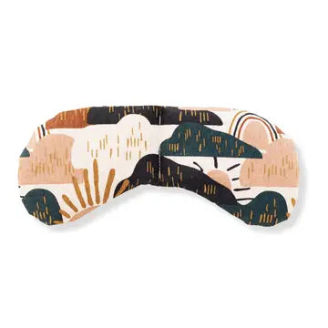 An eye mask therapy pack with a outdoor playful hill and rainbow design in multicolor, primarily in shades of orange, blue, and beige, displayed on a white background.