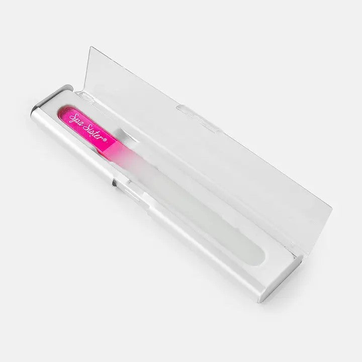 A rose and white glass nail file presented in a sleek, compact case.