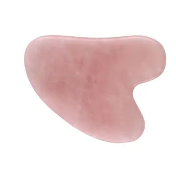 A rose quartz stone Gua Sha