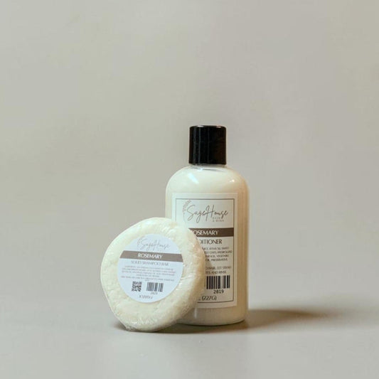 Bottle and shampoo bar on a plain background
