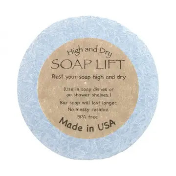 A round crystal soap lift with product label in the middle. On white background.