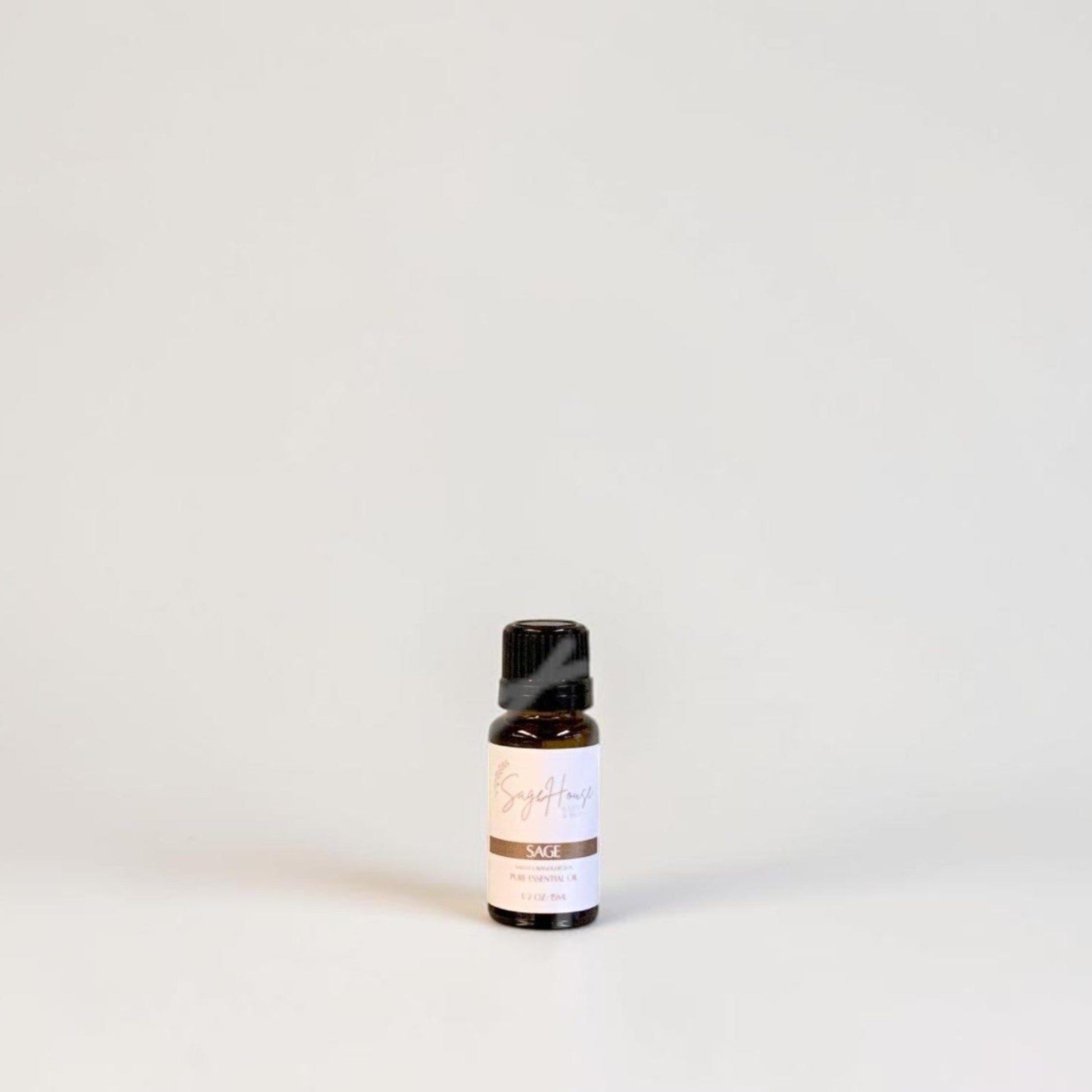 Amber bottle with label on a grey background.