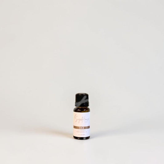 Amber bottle with label on a grey background.