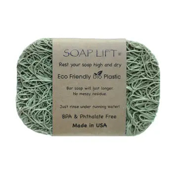 A sage soap lift with product band around the middle. On white background.