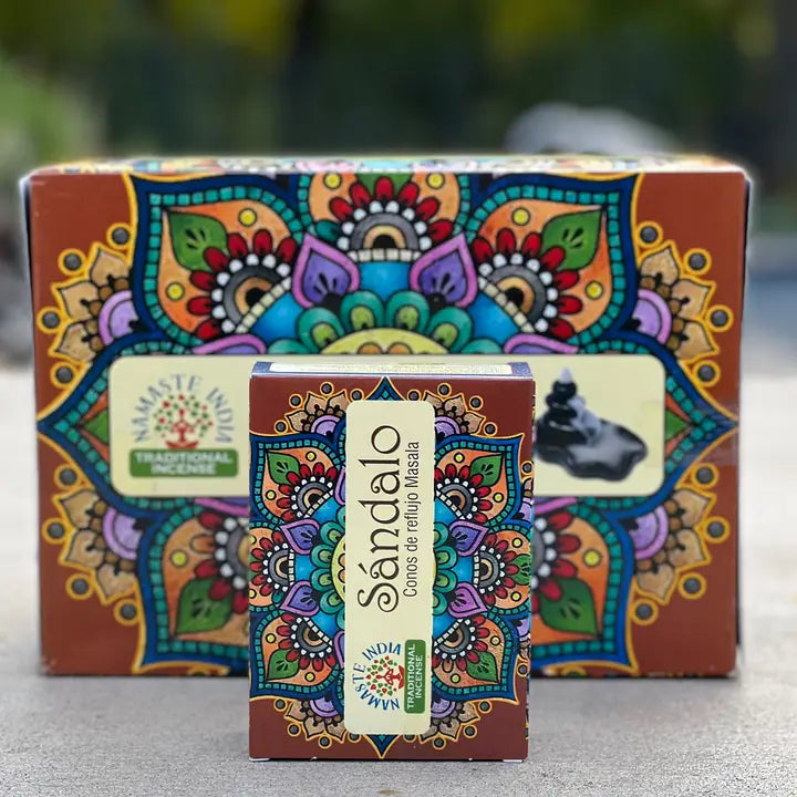 Small box of incense cones, with larger box behind with a nature background