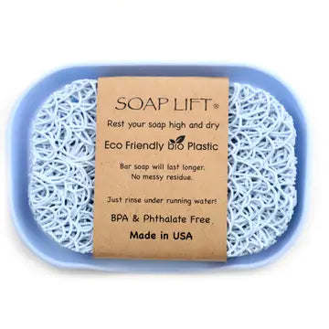 Seaside Blue colored soap dish with soap lift sitting inside. Soap lift sold seperately. On a white background