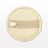 A round beige sponge pad with a strap attached, designed for use in bathing or showering.