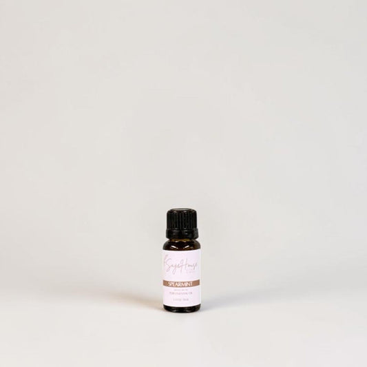 Amber bottle with label on a grey background.