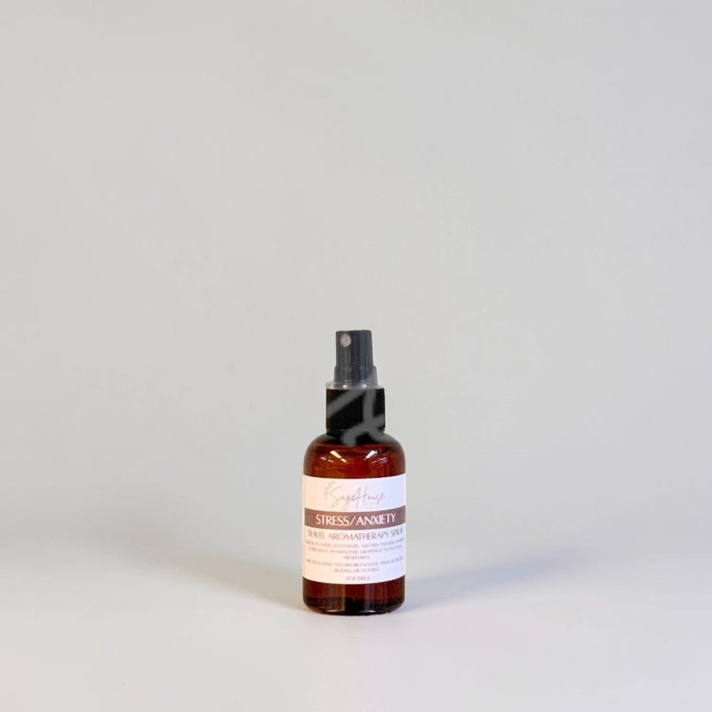 Bottle with a label on a plain background