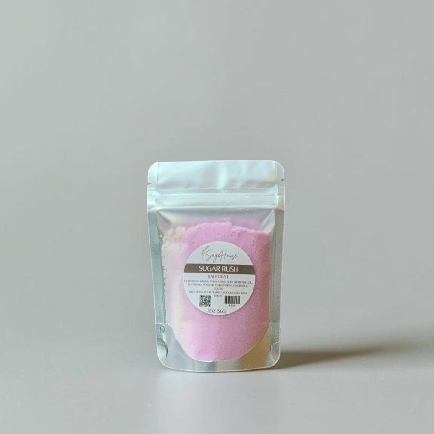 Clear packaging with pink contents on a light gray background