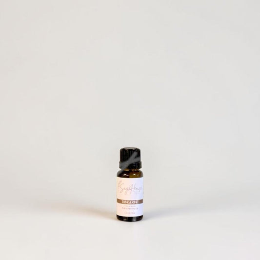 Amber bottle with label on a grey background.