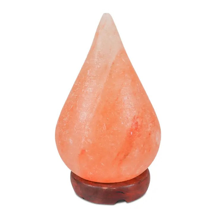 A pink Himalayan salt tear drop shape lamp on a dark base.