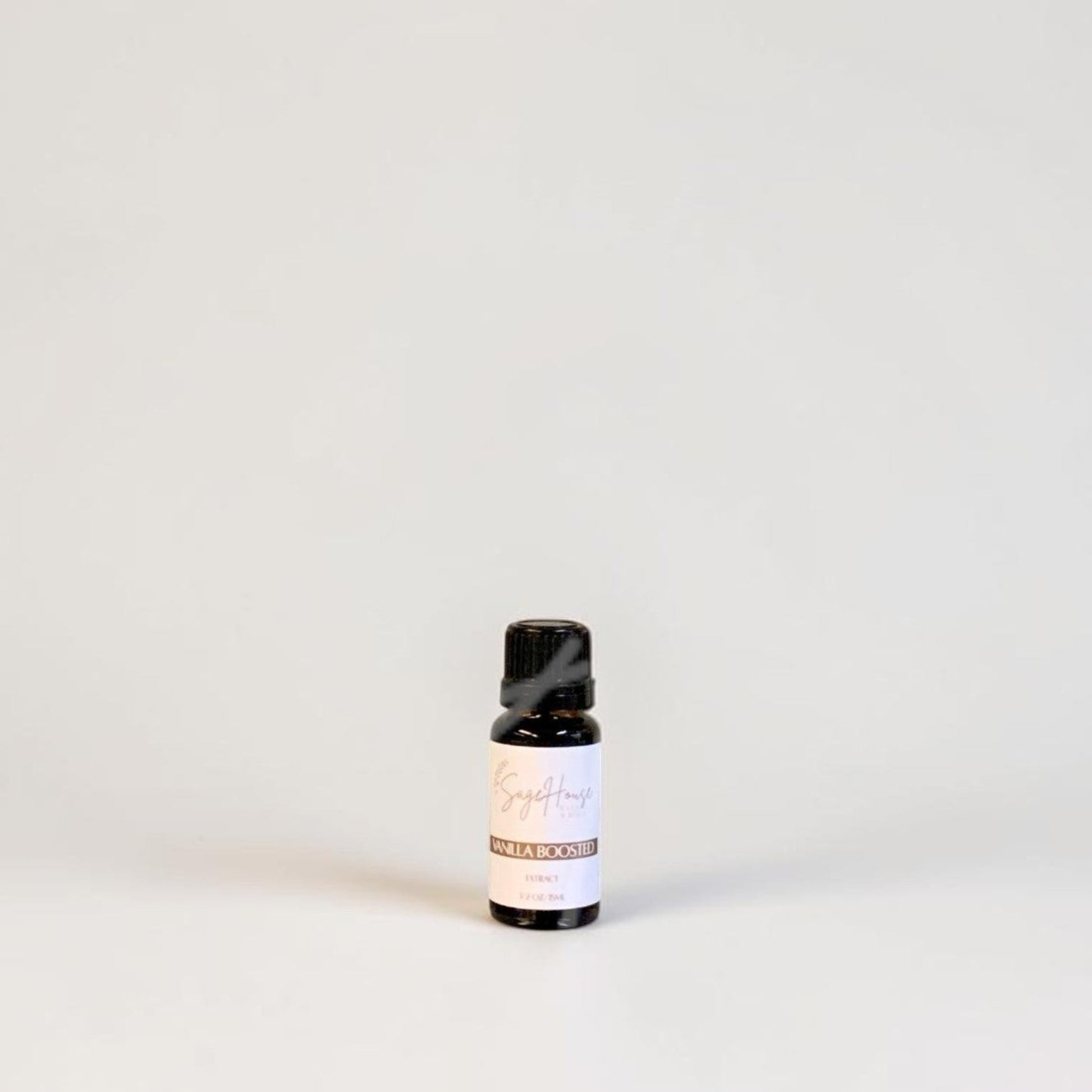 Amber bottle with label on a grey background.