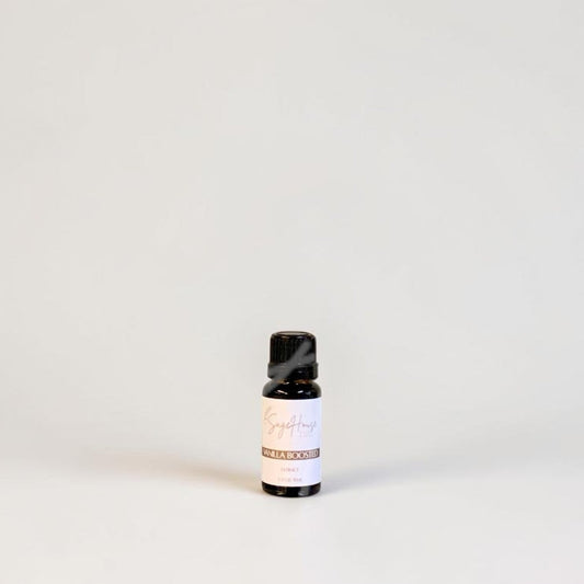 Amber bottle with label on a grey background.