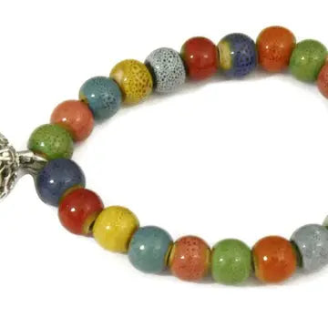 multi colored bead bracelet with lava bead in circular ball attached