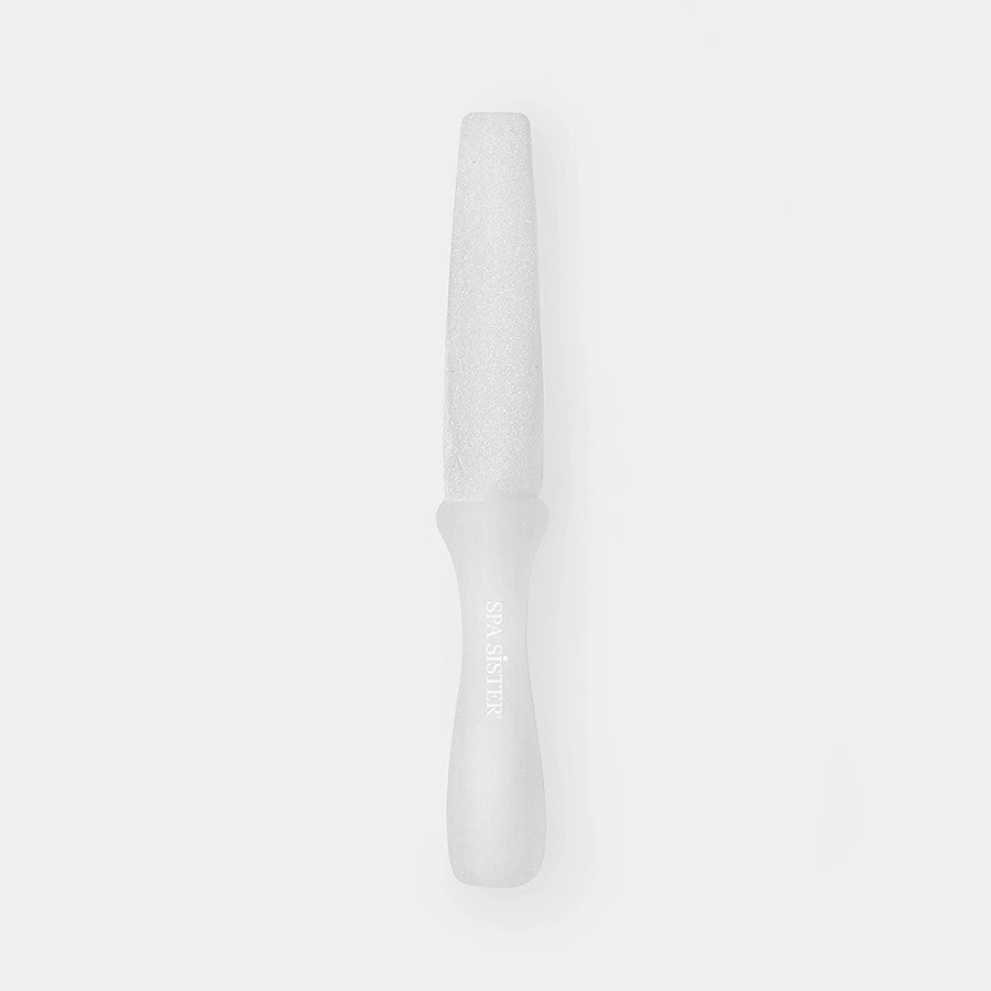 A white ergonomic callus remover with a textured surface and a handle.