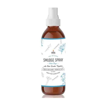 Bottle of white sage smudge spray with a white cap on a white background