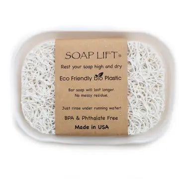 White colored soap dish with soap lift sitting inside. Soap lift sold seperately. On a white background